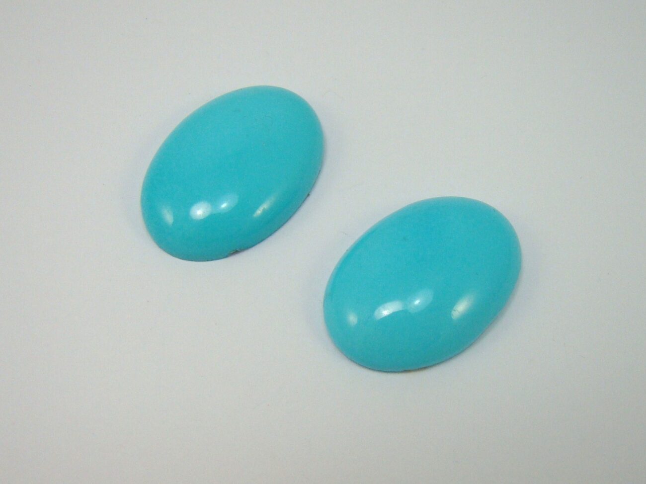 Pareja cabuchones 24x17mm oval turq.natural