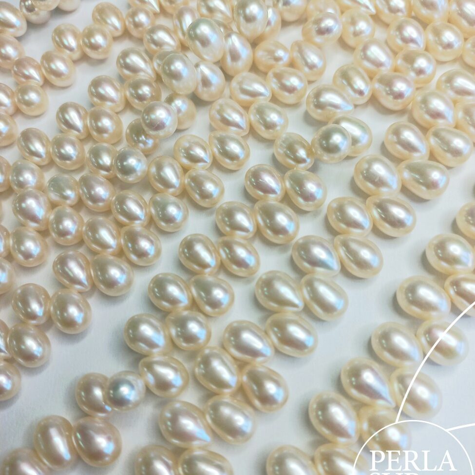 Hilo Perla Oval Cruzada 6-7mm Blanca