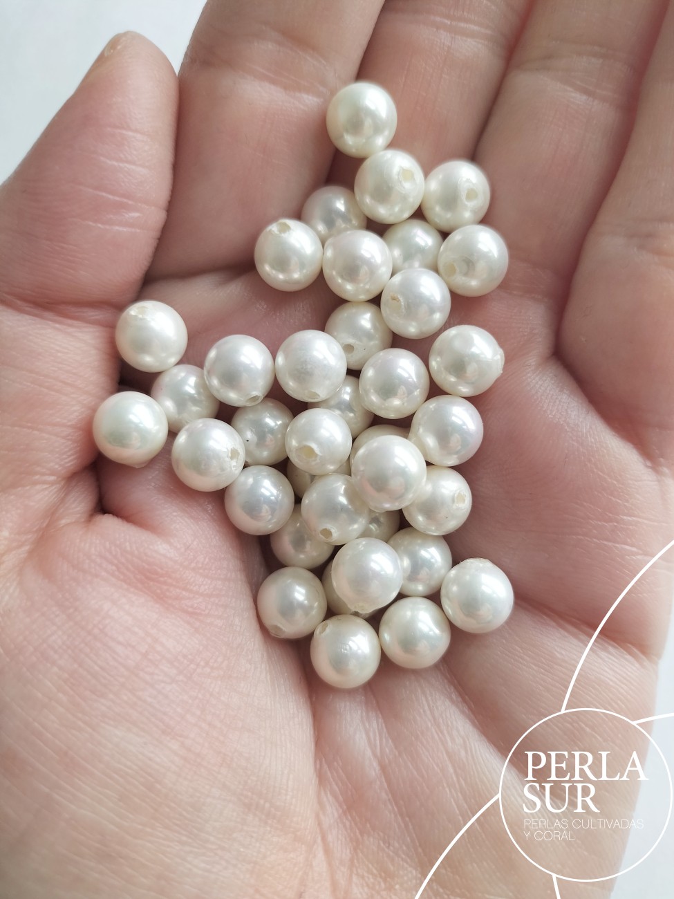 Perla shell 7mm 1/2t esférica blanca