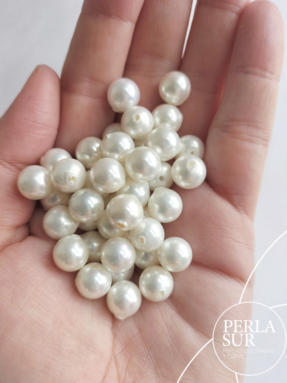 Perla shell 9mm 1/2t esférica blanca