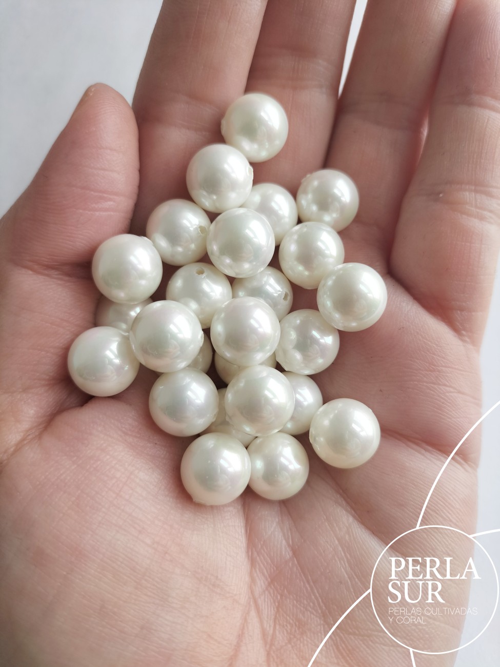 Perla shell 10-10'5mm 1/2t esférica blanca