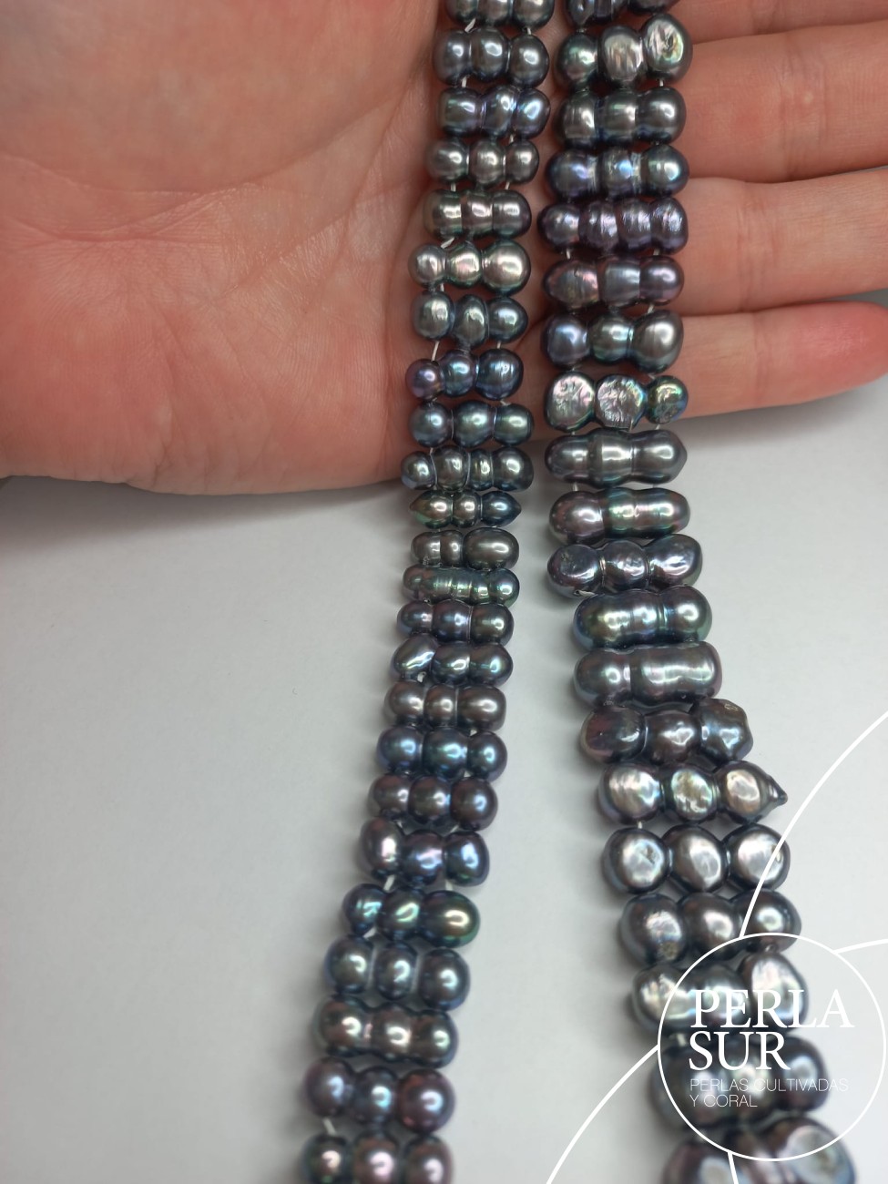 Hilo perla triple barroca peacock