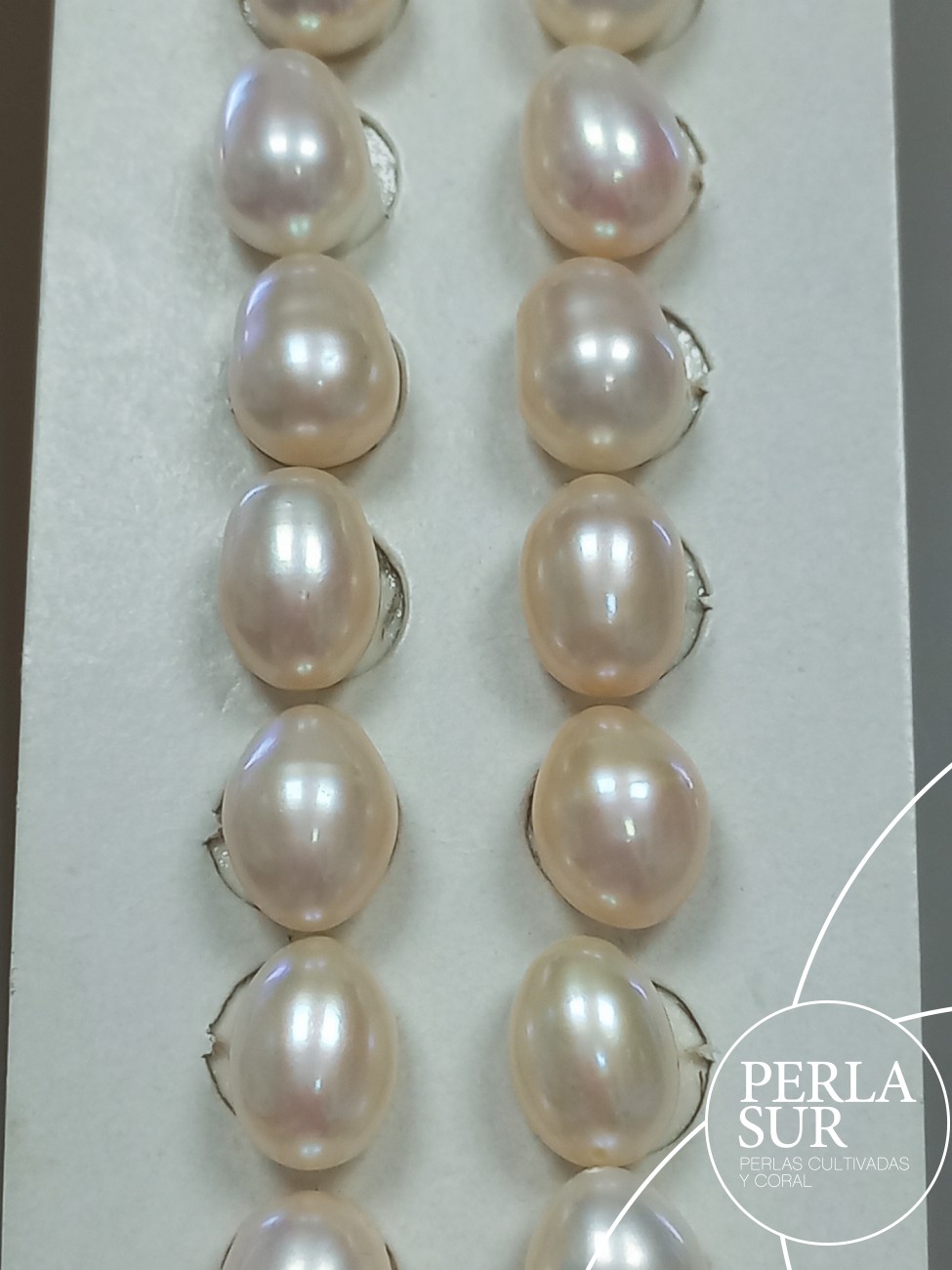 Pareja Perla Oval 8x11mm 1/2T. Blanca