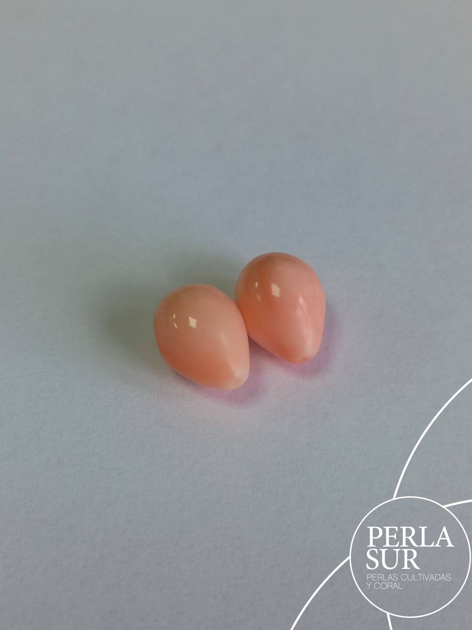 Par perillas 1/2t 9x12mm coral rosa