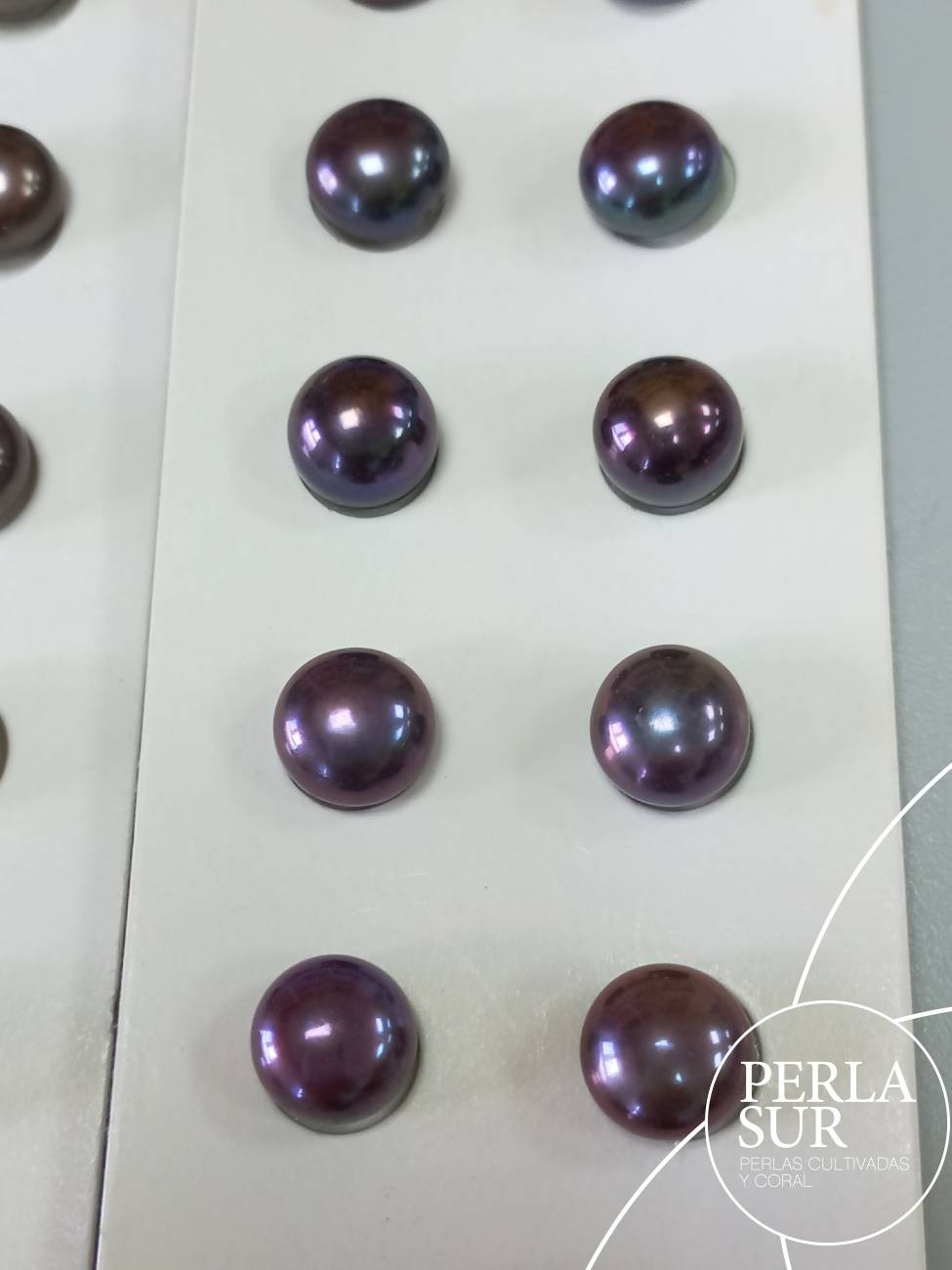 290022- Par Botón Azul 10-10'5mm 1/2t Peacock